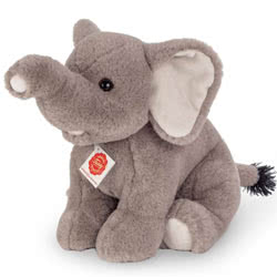 Teddy Hermann sitting Elephant soft toy in a 35 cm size. This large sized elephant comes with the softest grey fur, suede inner ears, tasselled tail and the most adorable, cute looks.