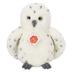Teddy Hermann Snowy Owl soft toy in a 21 cm size. Coming in a super soft white fluffy body with dark grey flecks. The wings are curved, and the feet and beak come in charcoal grey.