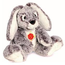 Teddy Hermann Grey Rabbit soft toy in a 21 cm size. Coming in a two-tone brown and white fluffy fur body with a soft white tummy and matching paws and inner ears.