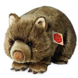 Teddy Hermann standing Wombat soft toy in a 26 cm size. Coming with soft brown mottled fur, little pointed ears and rounded snout, felt claws and deep brown eyes.