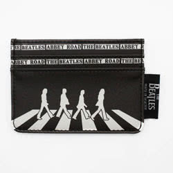 The Beatles Abbey Road Cardholder. This is a slimline cardholder featuring an iconic silhouette of The Beatles crossing Abbey Road. It features 4 outer pockets and space for either more cards or a little cash in the middle!