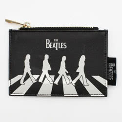 The Beatles Abbey Road Zip Purse. This is a slimline purse featuring an iconic silhouette of The Beatles crossing Abbey Road. This zipped pocket purse has 4 cardholder slots on the reverse, with a die-cut drum shape and black and white contrast colours to