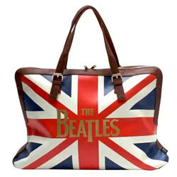 The Beatles Union Jack Overnight Bag. This is a statement tailored weekend bag, featuring a bold Union Jack print adorned with a gold foil Beatles logo. Perfect for a weekend away or as hand luggage on your next holiday..Comes with spacious interior, stur