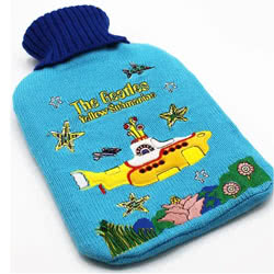 The Beatles Yellow Submarine Hot Water Bottle..A fun hot water bottle cover design featuring archive imagery from the iconic psychedelic adventure - Yellow Submarine! The design is complete with embroidered fish, stars and seaweed on a two-tone knitted co
