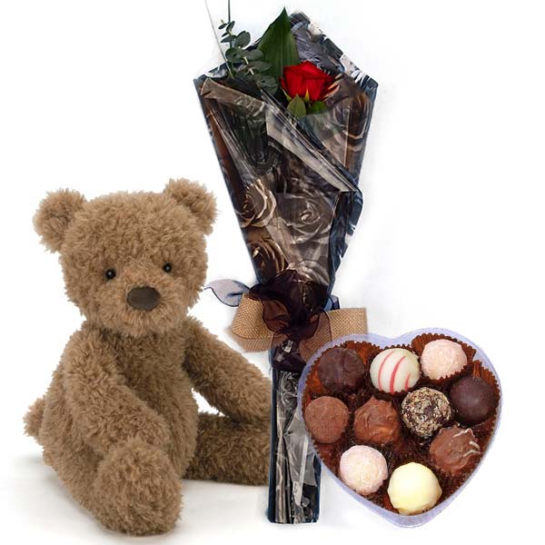 teddy bear with roses and chocolates