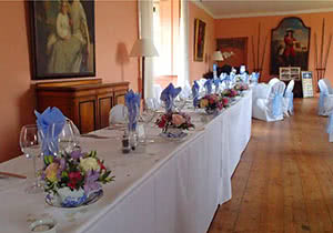 This is a picture of Wedding Reception Top Table Flower Arrangements in situ.